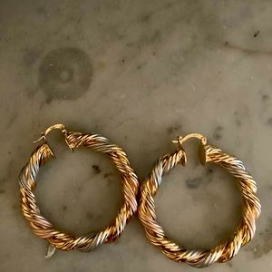 Stunning tricolor gold chunky twisted rope hoop earrings.